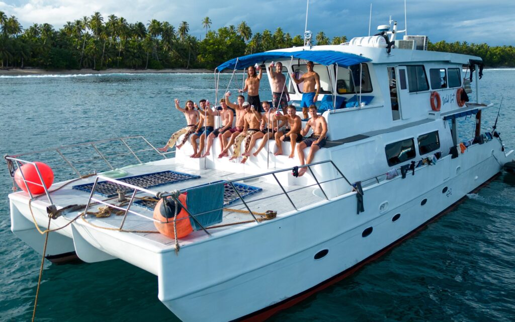 The Wild Cat surf charter boat cruising in the Mentawai Islands while hunting for perfect waves and barrels