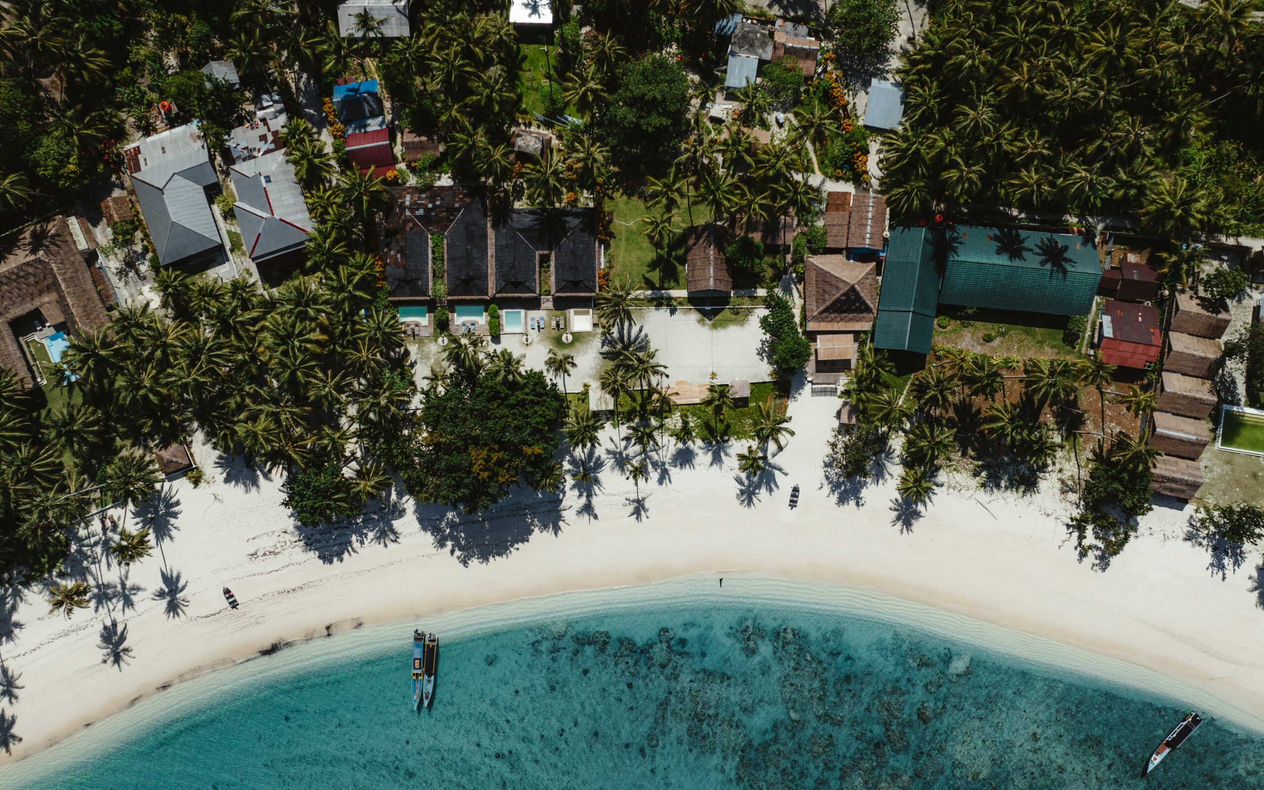 Stunning overhead drone photo of the Hollow Tree's Surf Resort in the Mentawai Islands